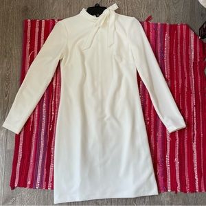 White, long sleeve, zipper back, neck tie design, SIZE 2, Calvin Klein,stretchy.